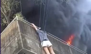 HEROÍNA FILIPINA SALVA CÃES DE INCÊNDIO AO ARREMESSÁ-LOS DO TERCEIRO ANDAR